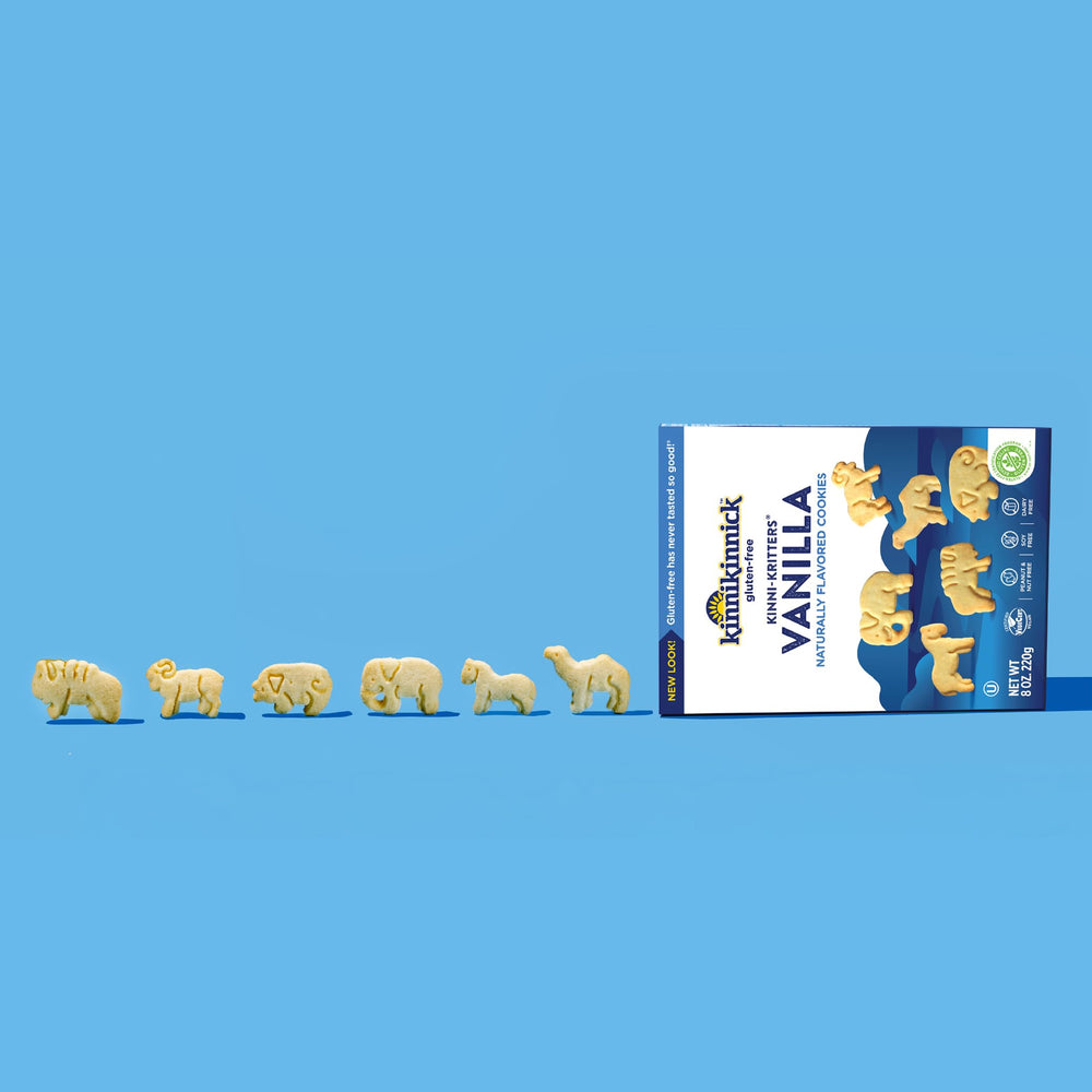 Kinnikinnick caja abierta con galletas visibles, práctica para merendar
