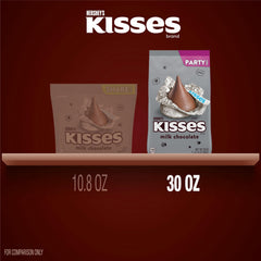 Kisses HERSHEY'S colocados sobre cupcake como adorno atractivo y práctico