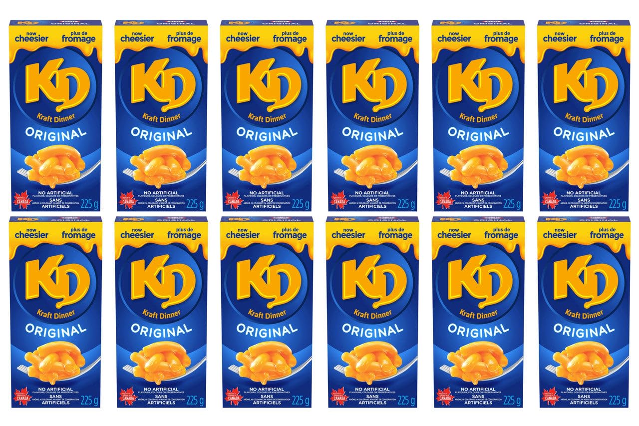Kraft Dinner sobre de polvo de queso abierto listo para mezclar, sabor cremoso práctico