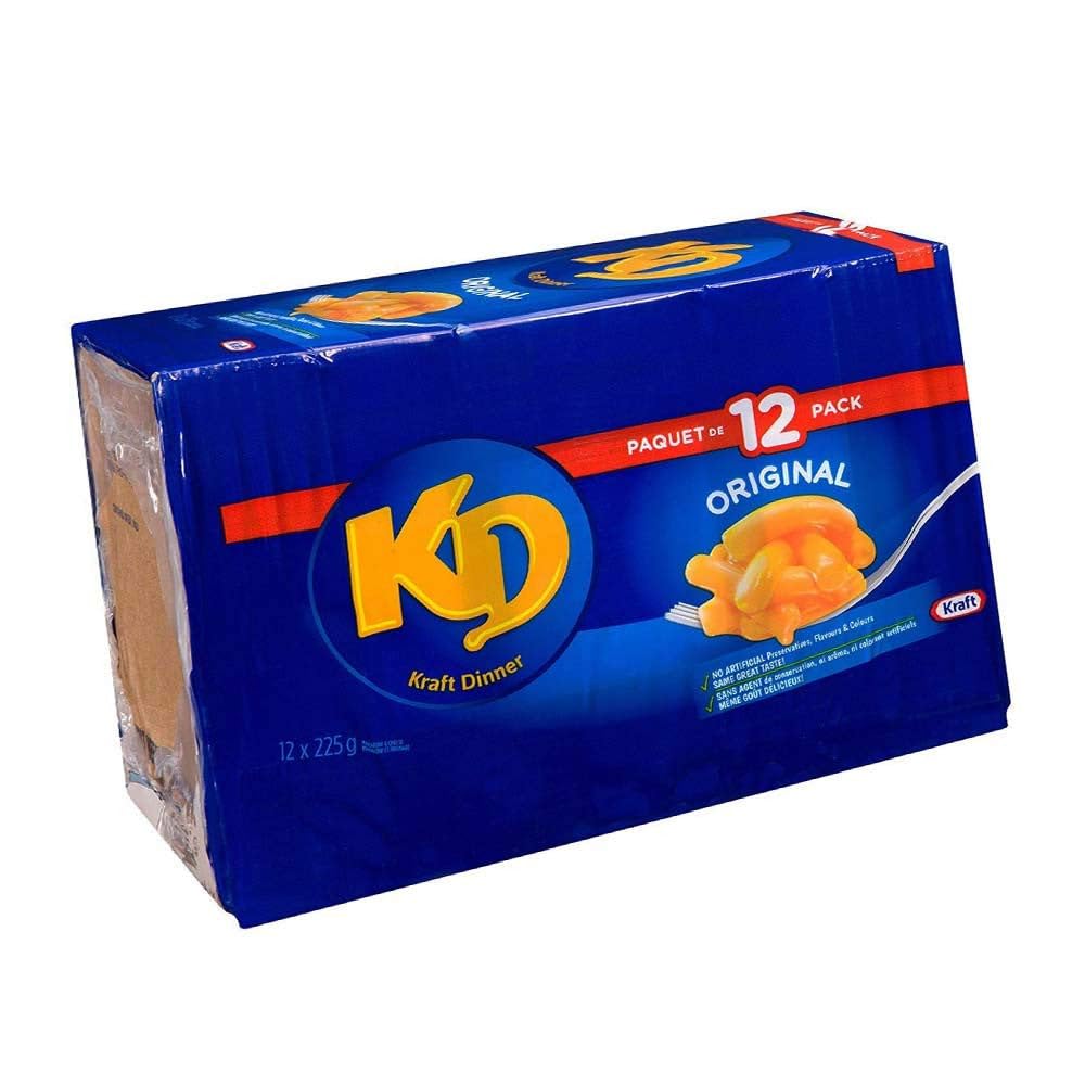 Kraft Dinner servido en plato hondo con textura cremosa y apetecible, listo para comer