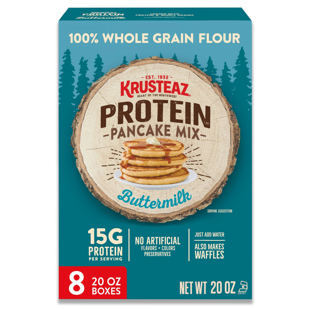 Krusteaz empaque frontal mostrando mezcla y beneficio de 15 g proteína