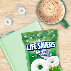 Life Savers comparación de tamaño junto a una moneda, referencia de escala portátil