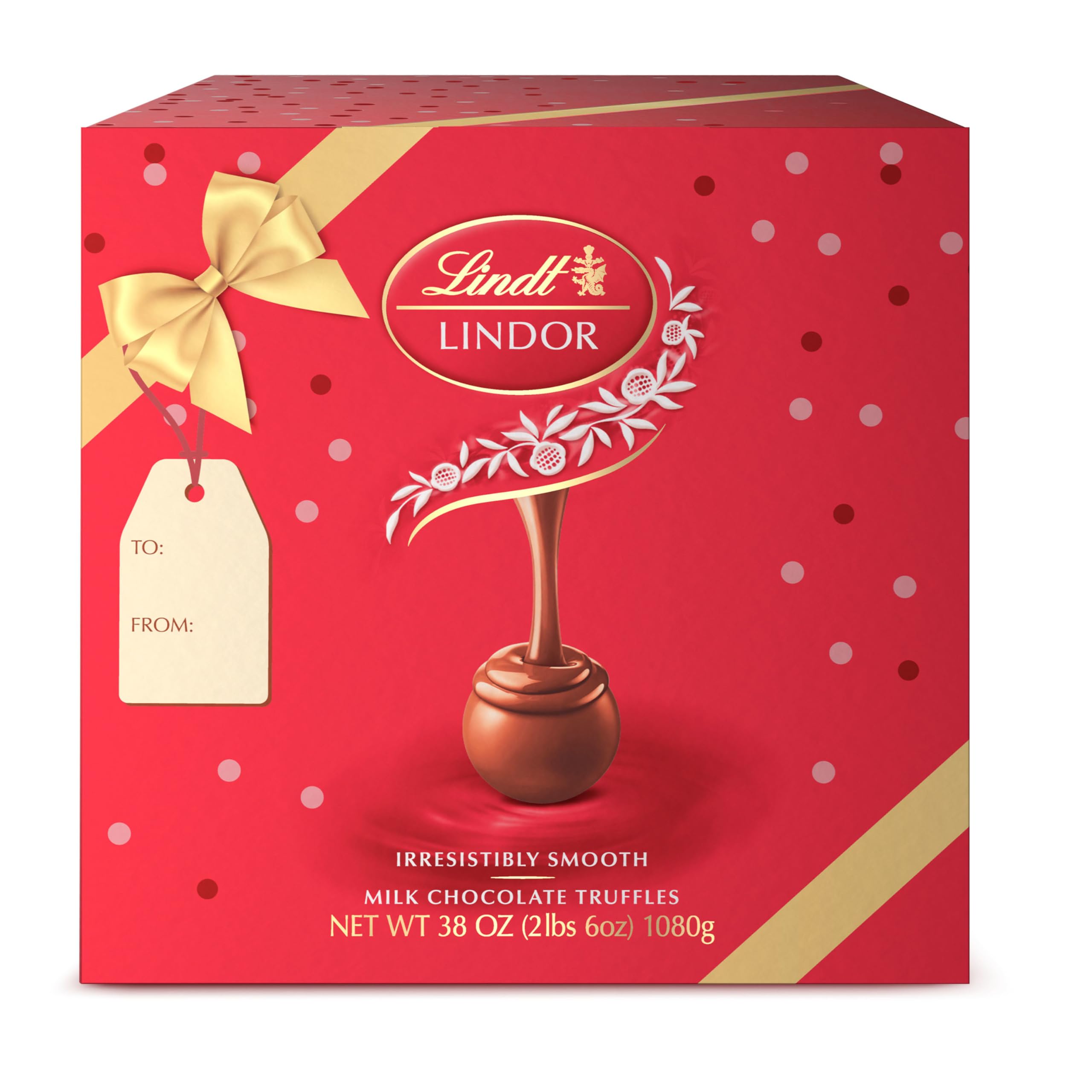 Lindt trufa junto a regla para comparar tamaño real