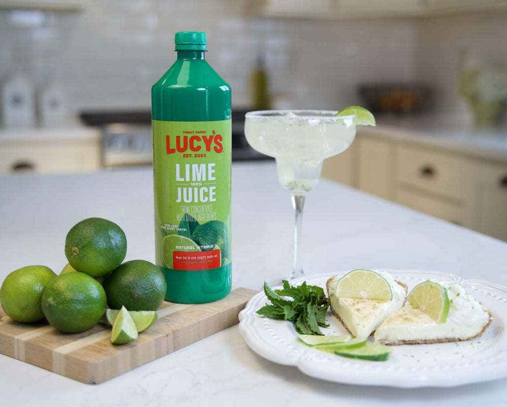 Lucy’s botella junto a una regla para comparar tamaño y rendimiento del envase