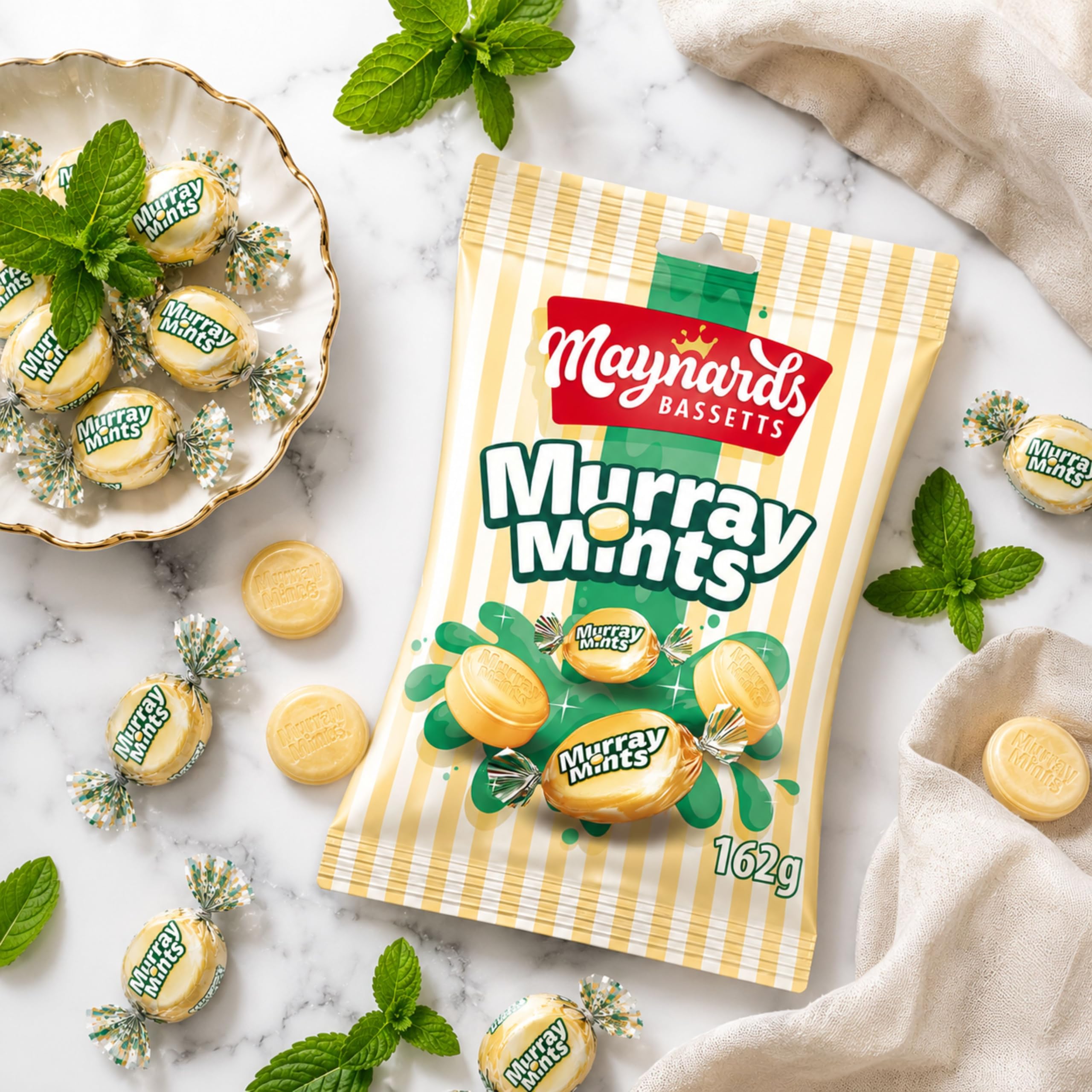 Maynards Bassetts pastilla en mano mostrando la escala y portabilidad