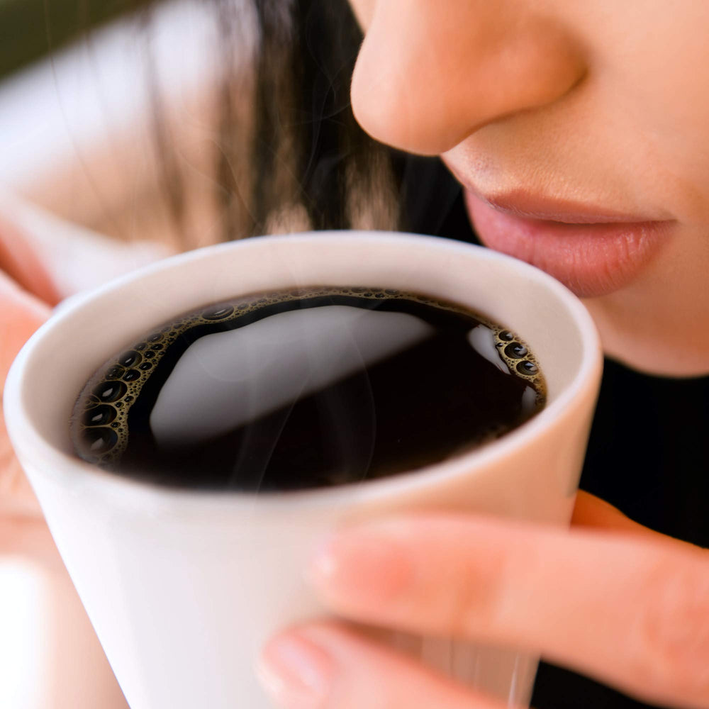 McCafé café con leche servido, cremosidad y sabor equilibrado