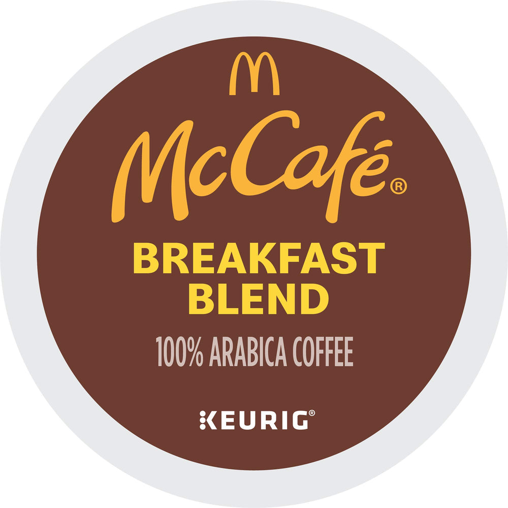 McCafé cápsula en mano compatible con máquinas Keurig, lista para usar