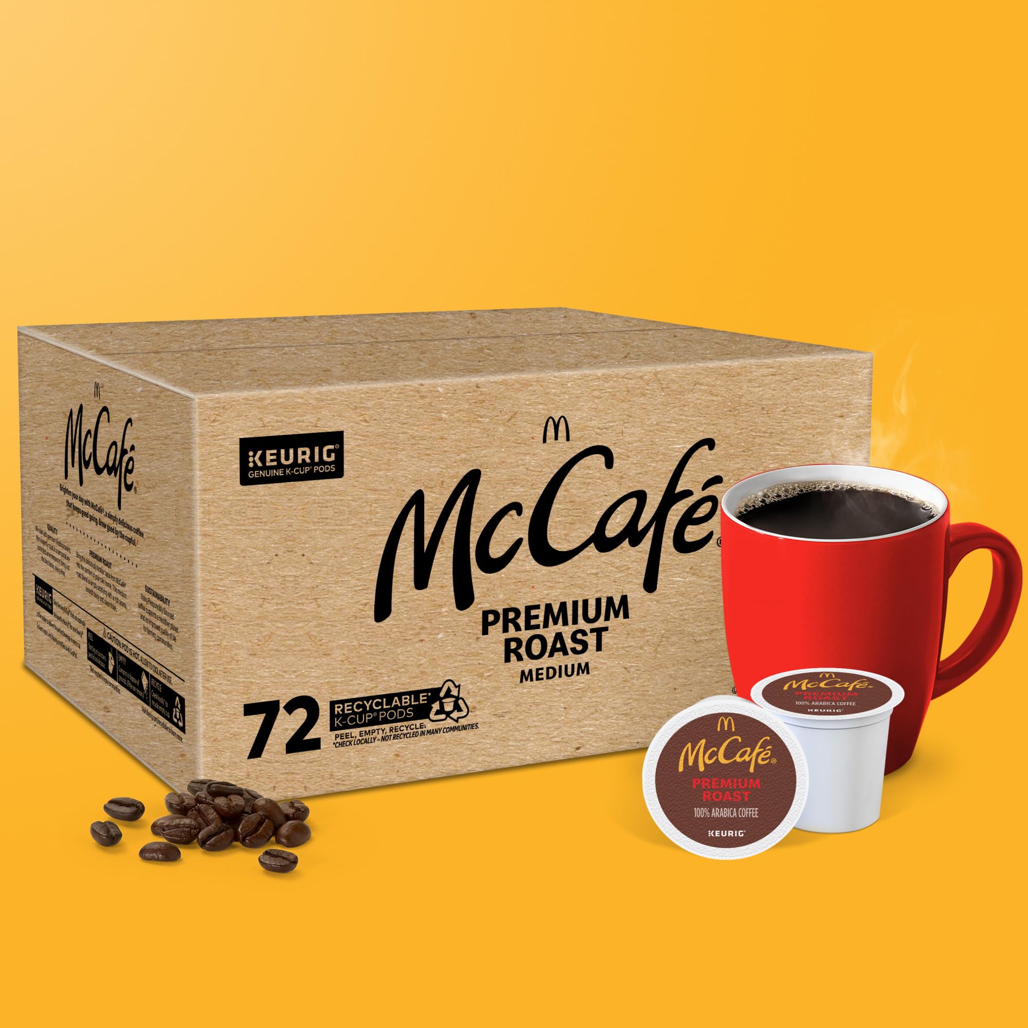 McCafé cápsula junto a mano para comparar tamaño y porciones
