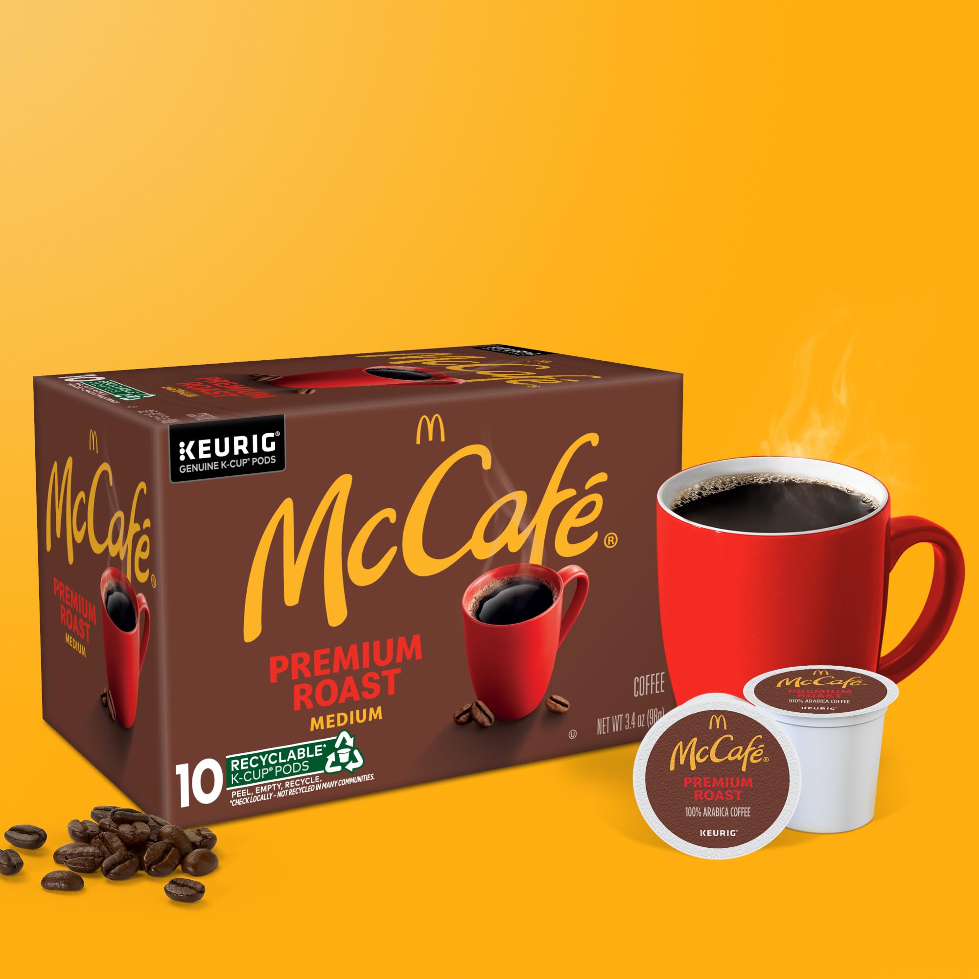 Tapa pelada y cápsula vacía McCafé con indicación de reciclaje local