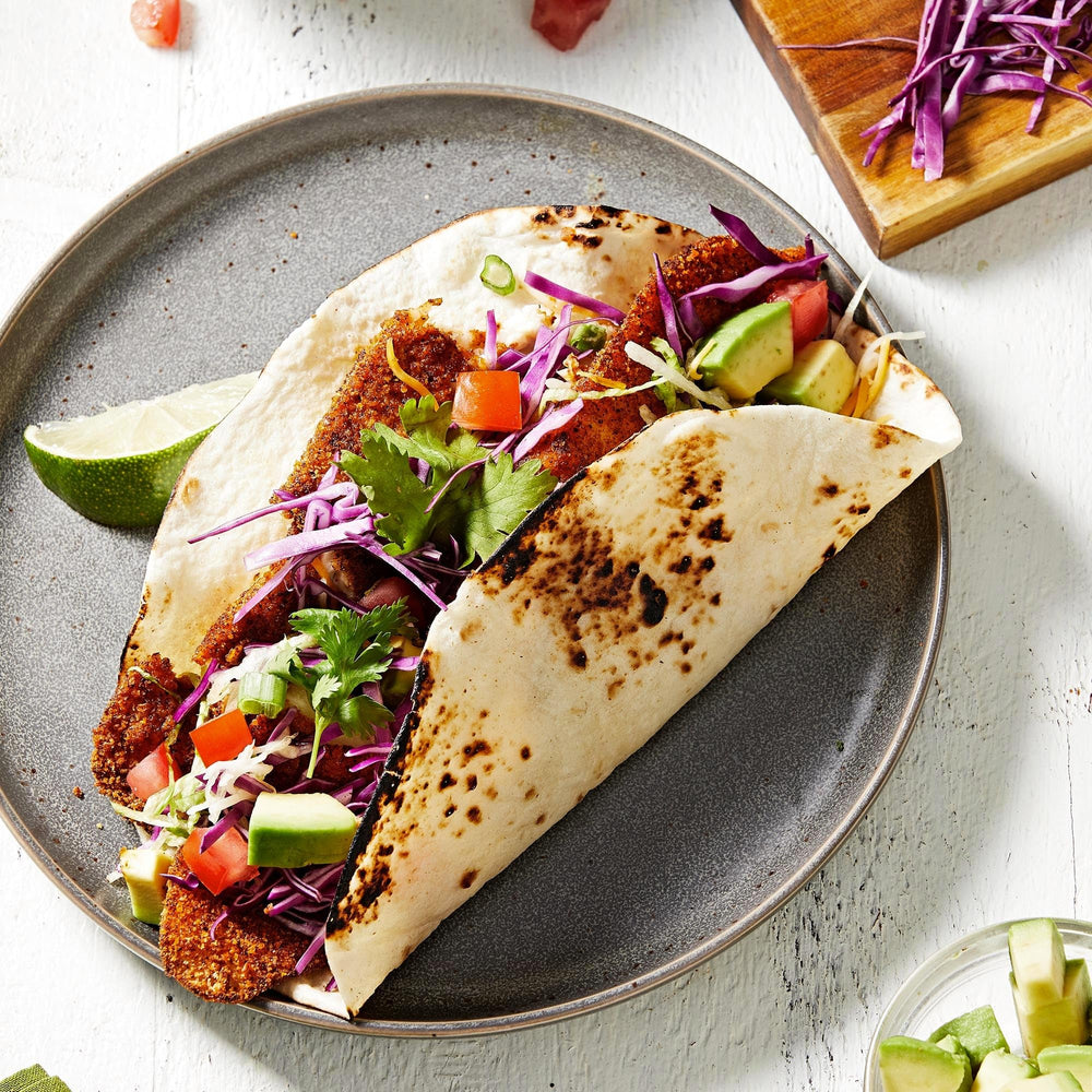 McCormick condimento espolvoreado sobre vegetales asados nutritivos