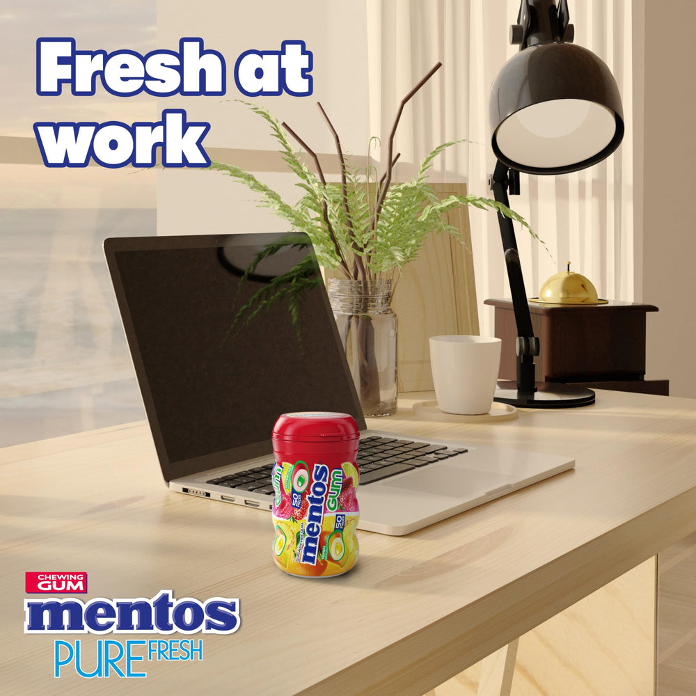 MENTOS botella abierta con chicles visibles lista para consumir