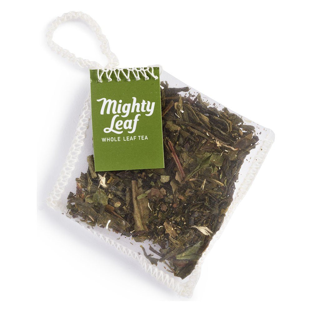Mighty Leaf bolsita de malla con hojas enteras visible, garantiza extracción completa