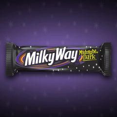 Milky Way corte que expone caramelo fluido y contraste de sabores intensos