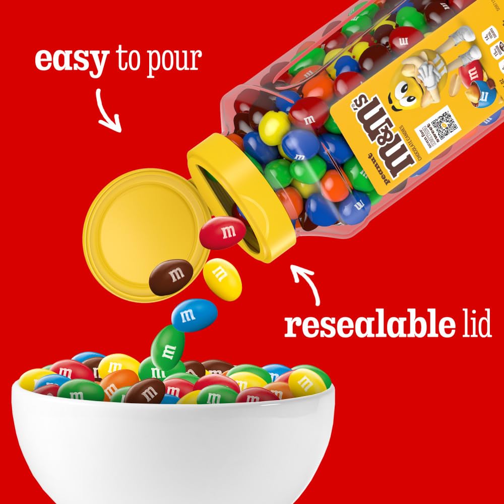 M&M's tarro en mano para comparar tamaño y transportar cómodamente