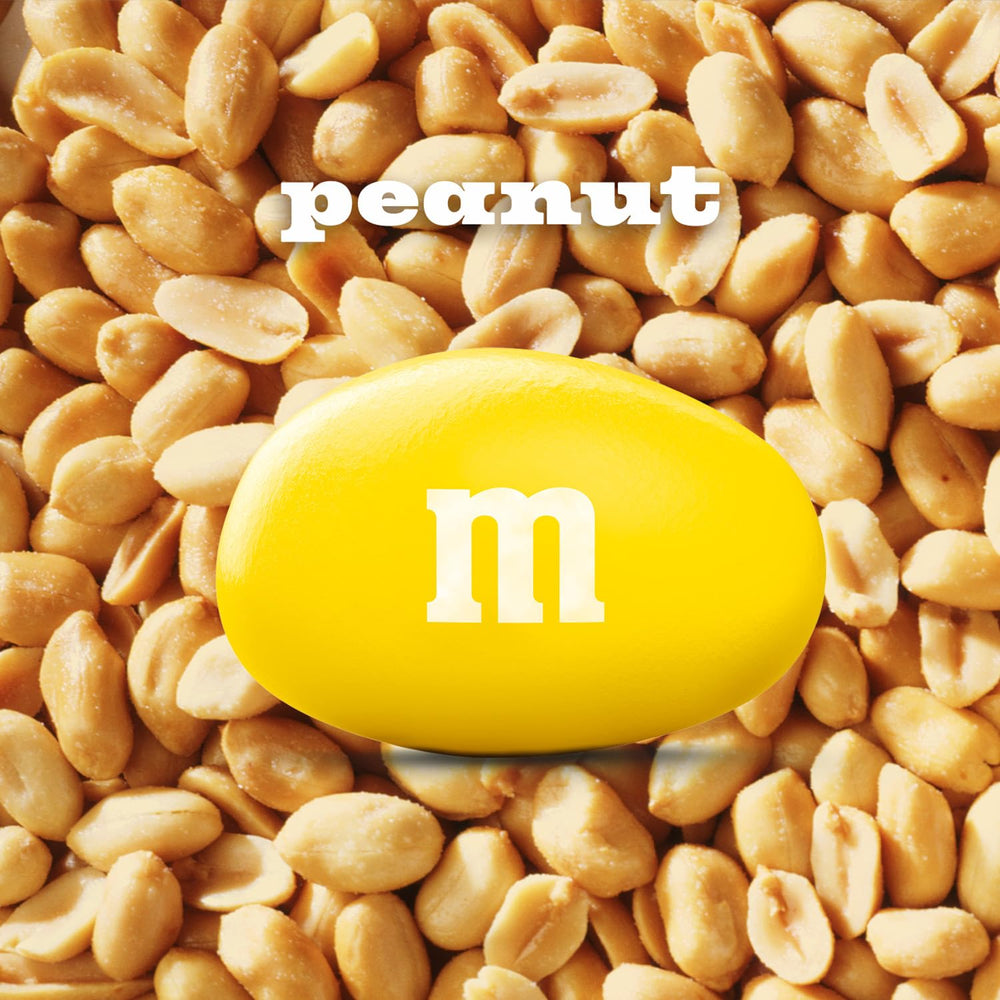 M&M's tarro abierto vertiendo en cuenco, práctico para servir en reuniones