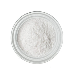 Modernist Pantry mano comparando tamaño del frasco 50g para escala