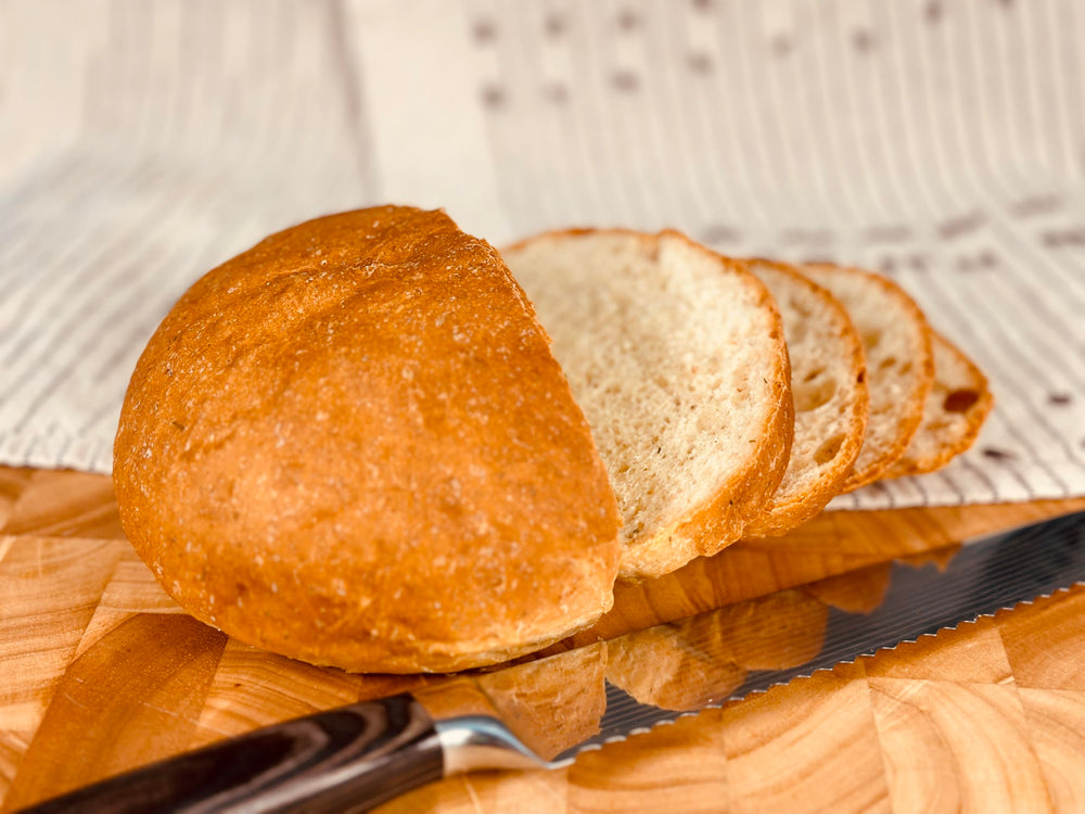 Molibake mezcla en panificadora en uso facilitando horneado sin complicaciones