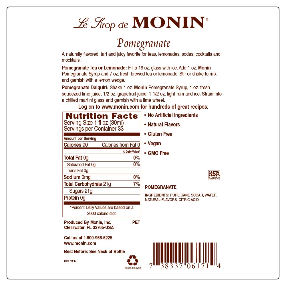 Monin jarabe de granada en barra de cafetería mostrando uso profesional