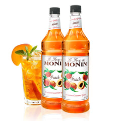 Monin jarabe de durazno botella frontal, presentación clara y atractiva