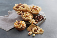 Moose Munch bol con palomitas servido en mesa ideal para compartir