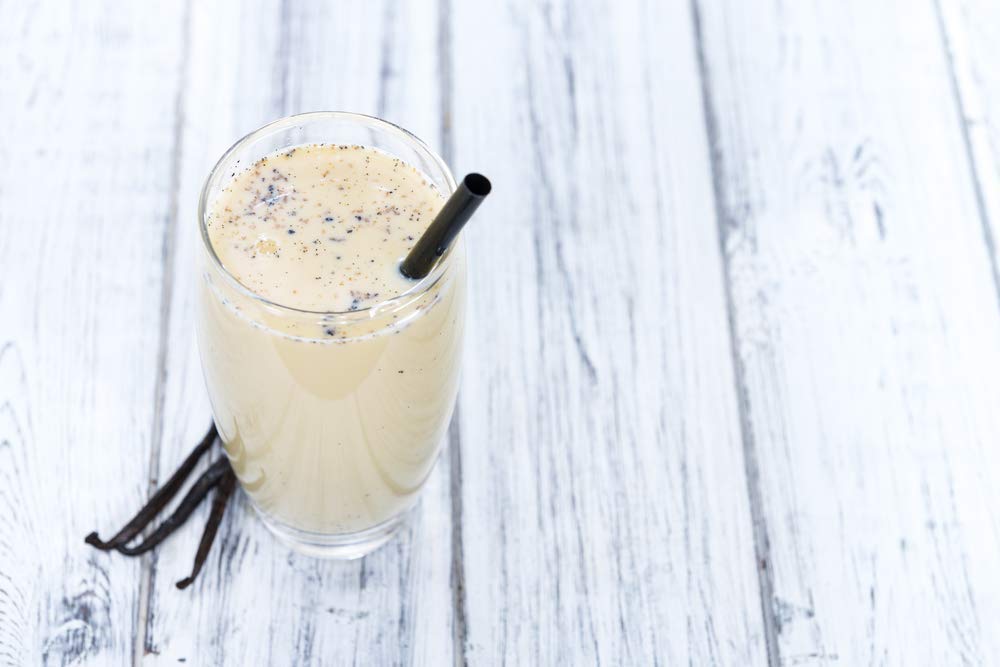 Native Vanilla 4oz comparado con utensilio para referencia de tamaño