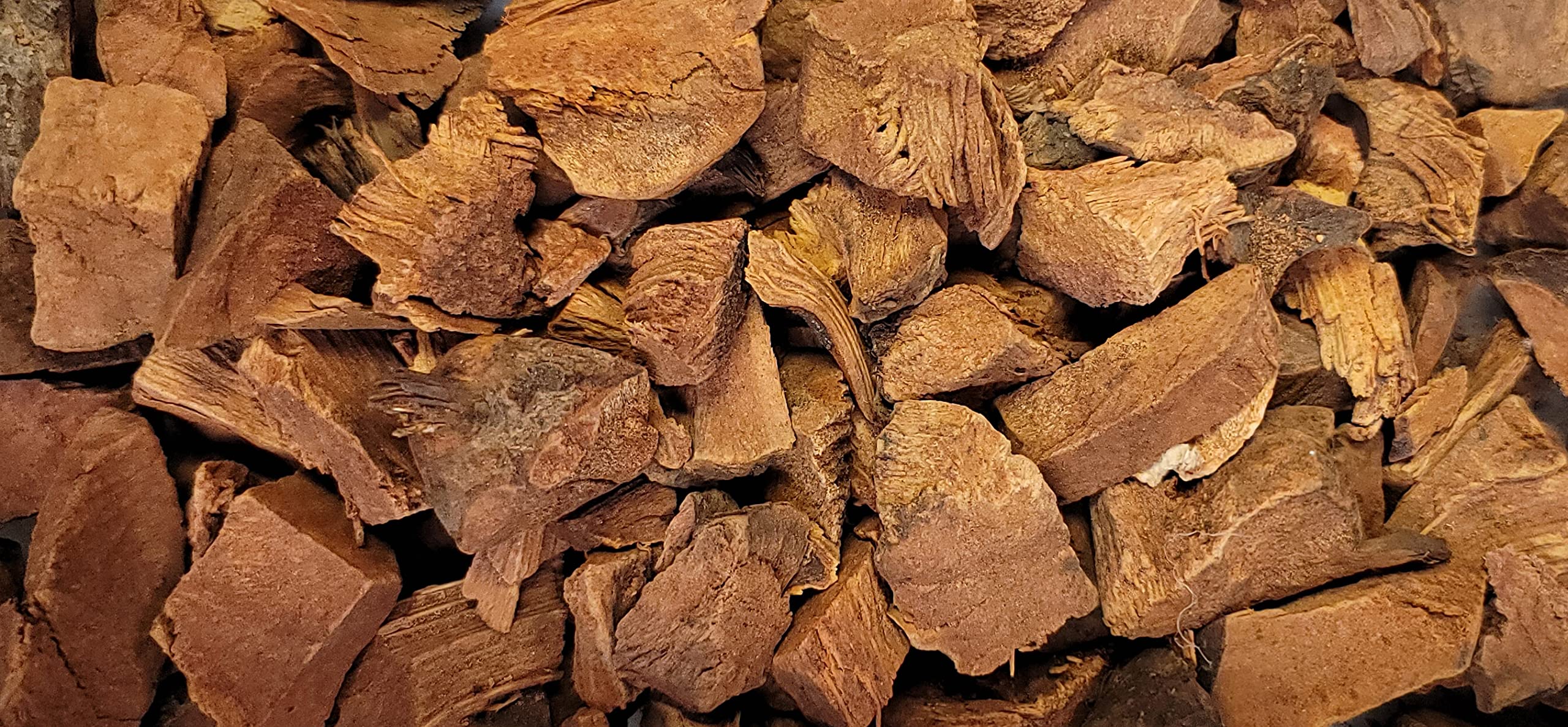 Naturejam cocolmeca comparación de tamaño de trozos de raíz sobre mano