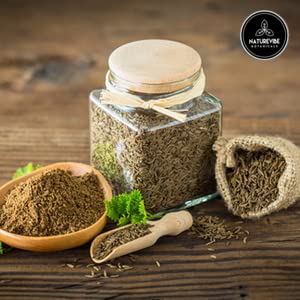 Naturevibe Botanicals cucharada de comino molido lista para sazonar platos