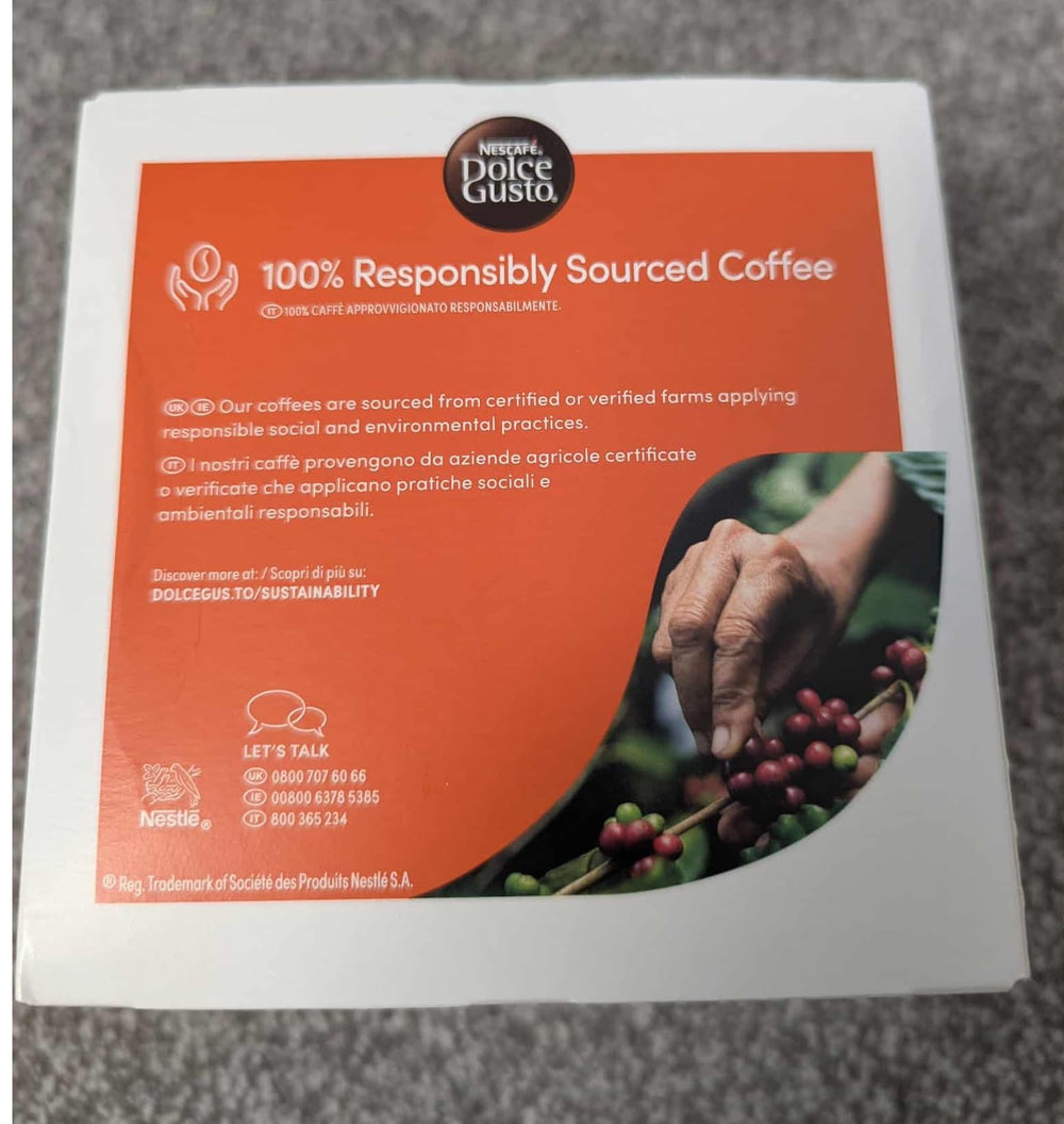Nescafe Dolce Gusto taza servida con capas visibles y caramelo para disfrutar en casa