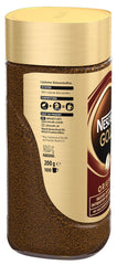 Nescafé Gold junto a una cuchara para comparar tamaño y rendimiento