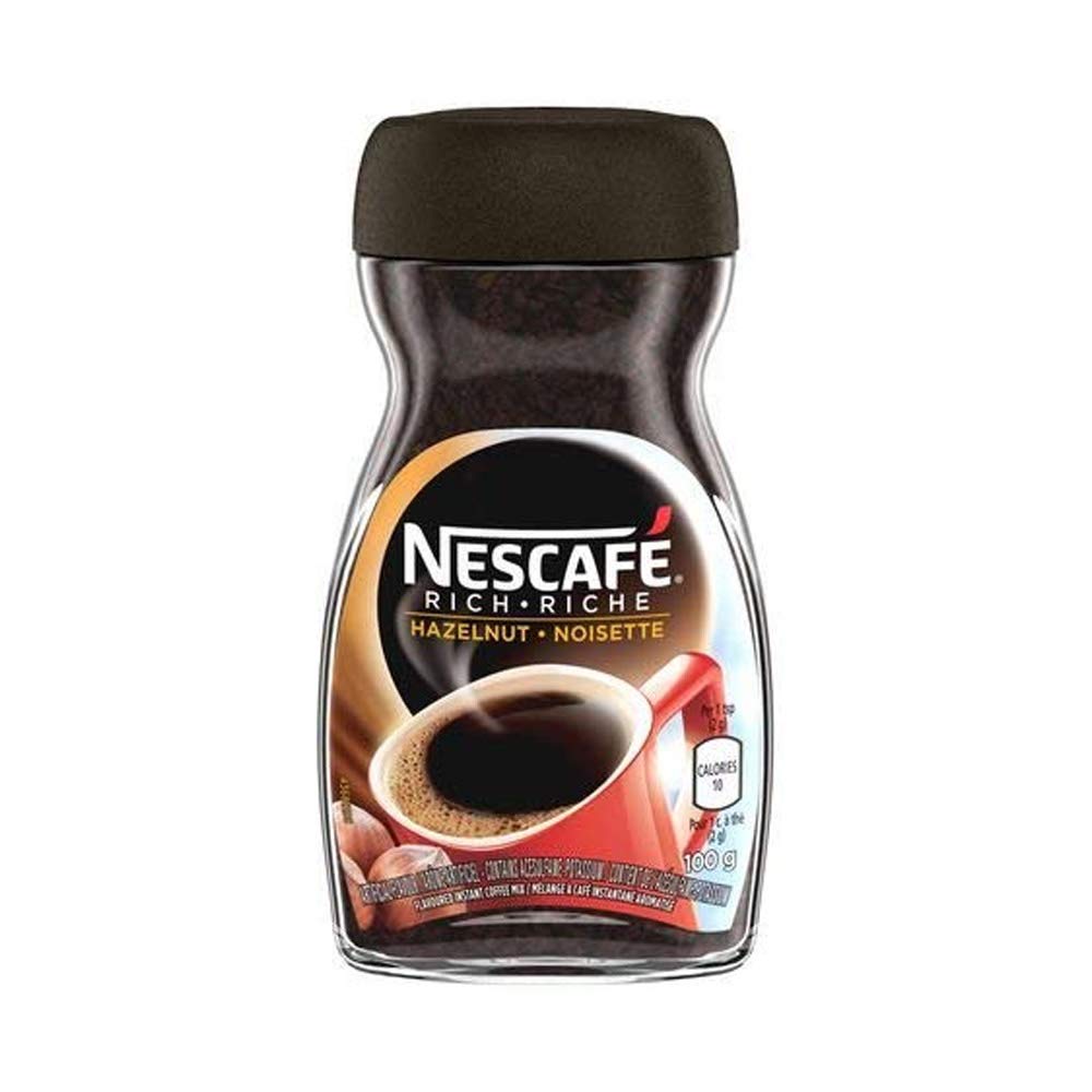 NESCAFÉ primer plano del polvo disoluble resaltando textura homogénea