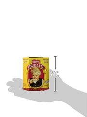 Comparación de tamaño de tabletas Nestlé Abuelita junto a una cuchara para dosificar