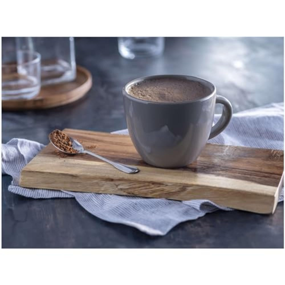 Nestle Hot Cocoa polvo grueso detalle, muestra textura rica para sabor intenso