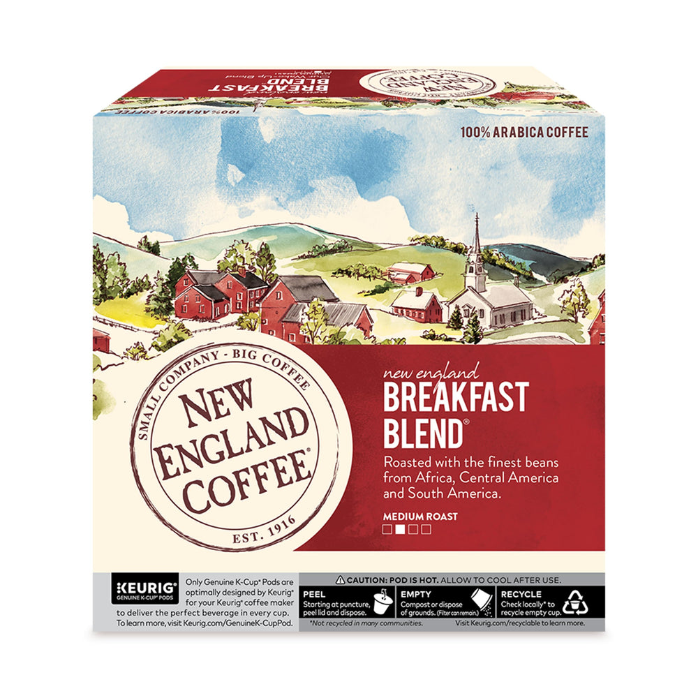 New England Coffee cápsula junto a mano para comparar tamaño y facilidad de uso