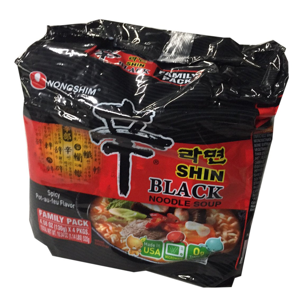 Nongshim Shin Black servido en tazón con guarniciones que realzan el sabor