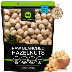 Nut Cravings empaque frontal mostrando la bolsa resellable y beneficio de frescura
