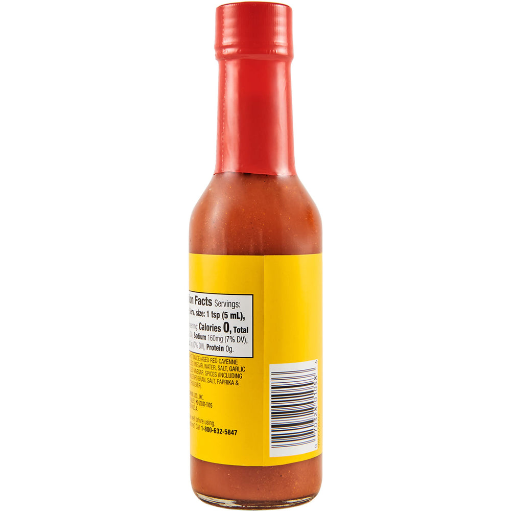 OLD BAY textura roja de la salsa que destaca su consistencia fluida