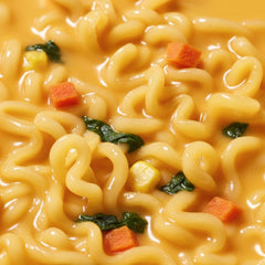 OTOKI caldo cremoso y queso cheddar visible, aporta aspecto untuoso y apetitoso