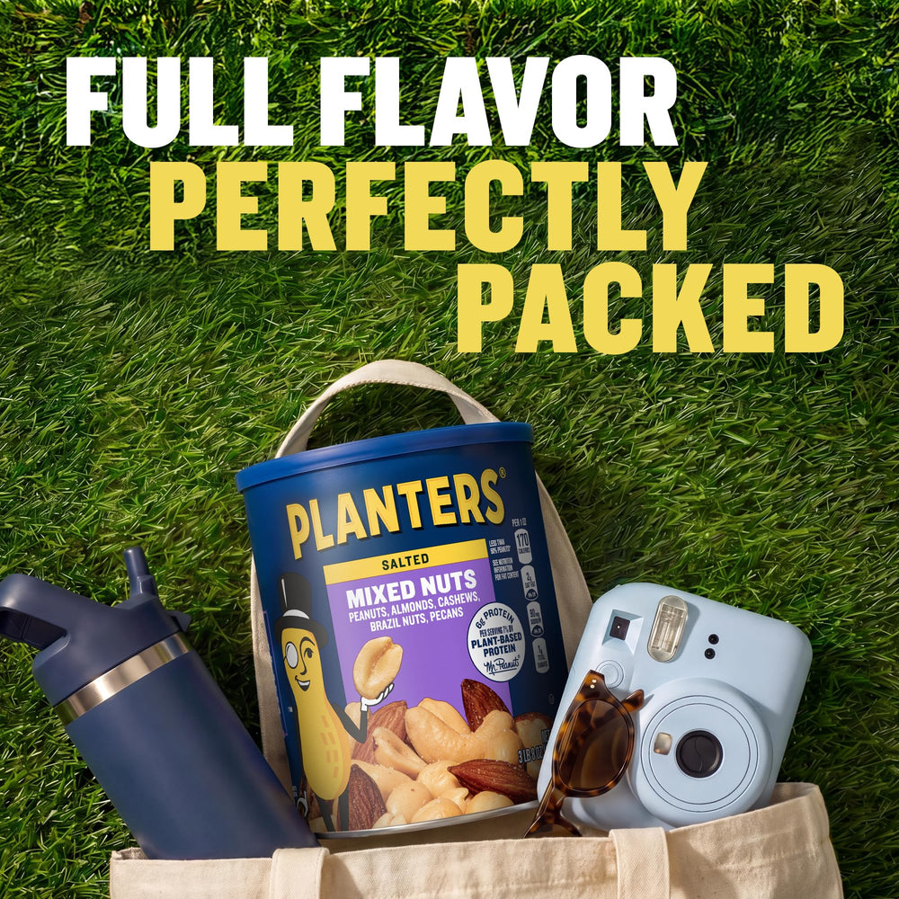 PLANTERS mano tomando nueces para snack inmediato
