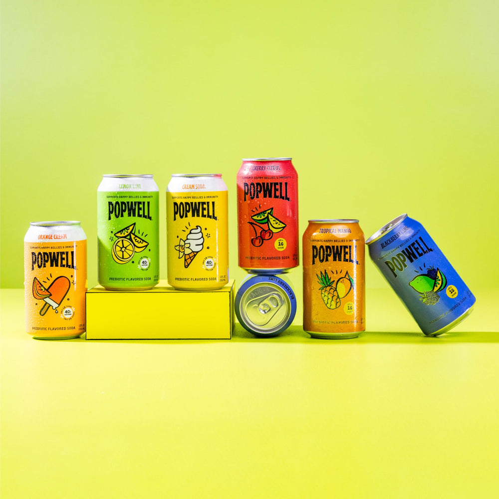 Popwell Tropical Mango etiqueta con información de fibra y vitaminas clara