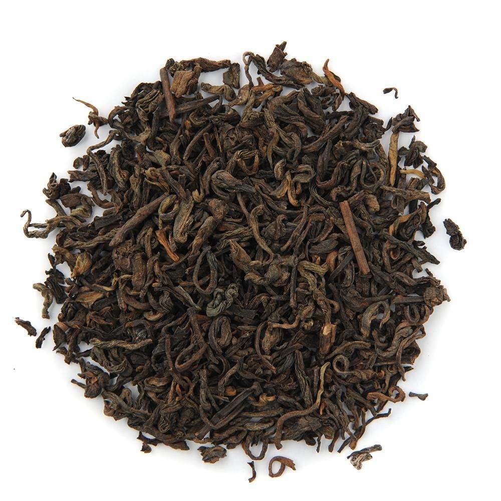 Organic Positively Tea servido en mesa estilo de vida para inspirar consumo diario