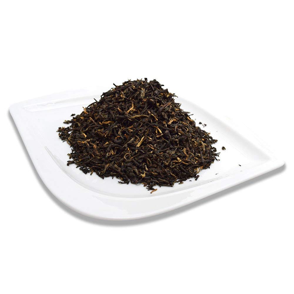 Organic Positively Tea Company detalle de textura de las hojas sueltas indicando frescura y cuerpo