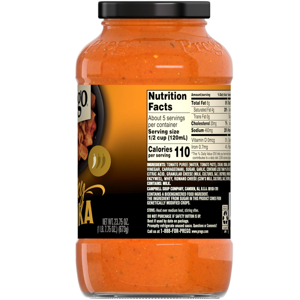 Prego salsa en mesa familiar durante cena mostrando unión y ahorro de tiempo