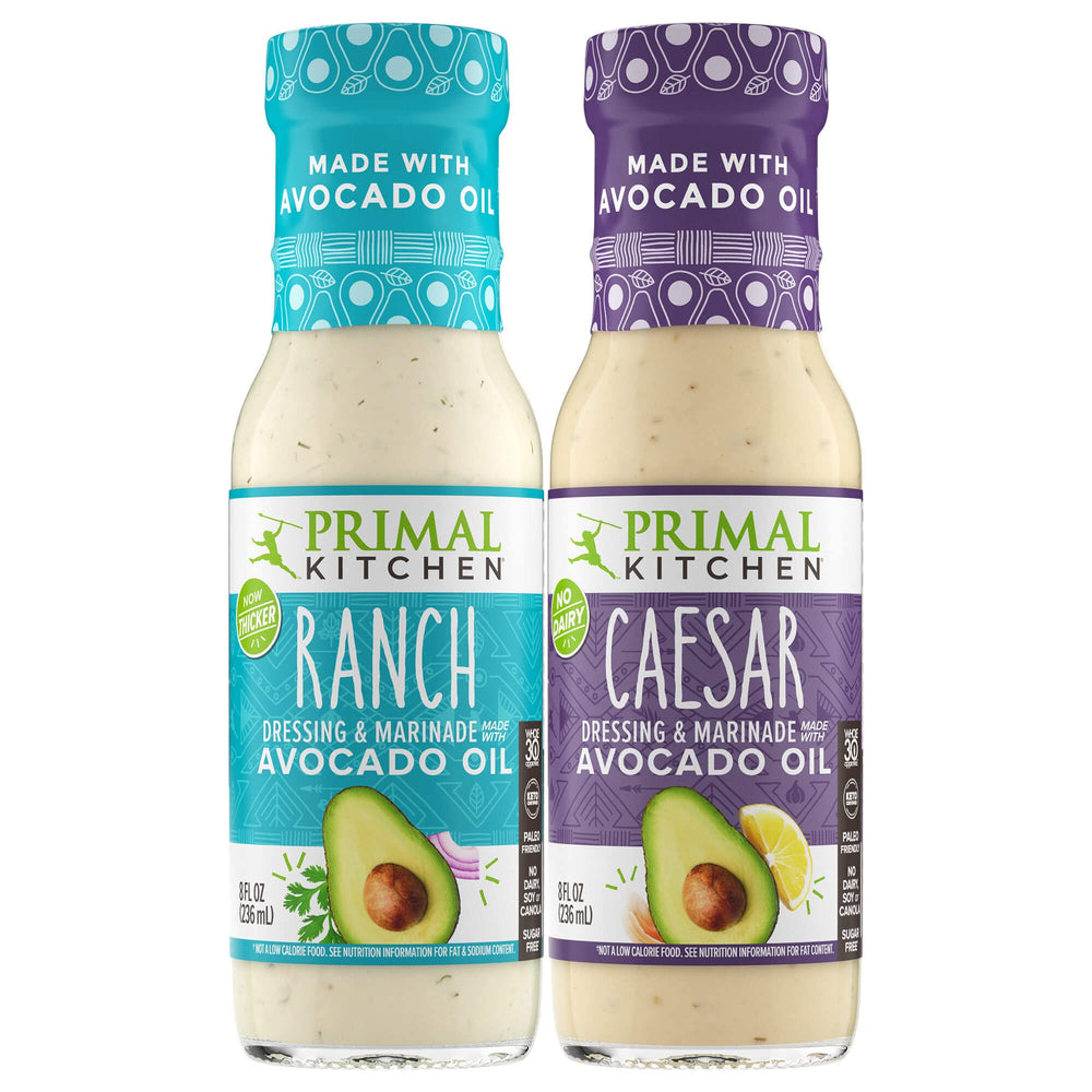 Primal Kitchen pack frontal mostrando botellas Ranch y César; opción sabrosa y sana