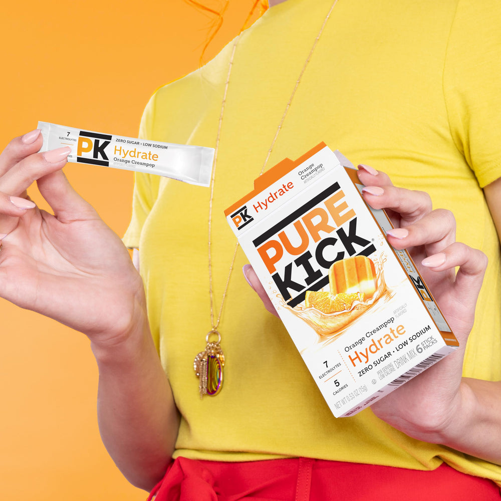 PURE KICK comparación de tamaño con botella para visualizar porción portátil