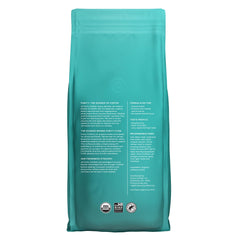 PURITY COFFEE primer plano de granos enteros destacando calidad especialidad