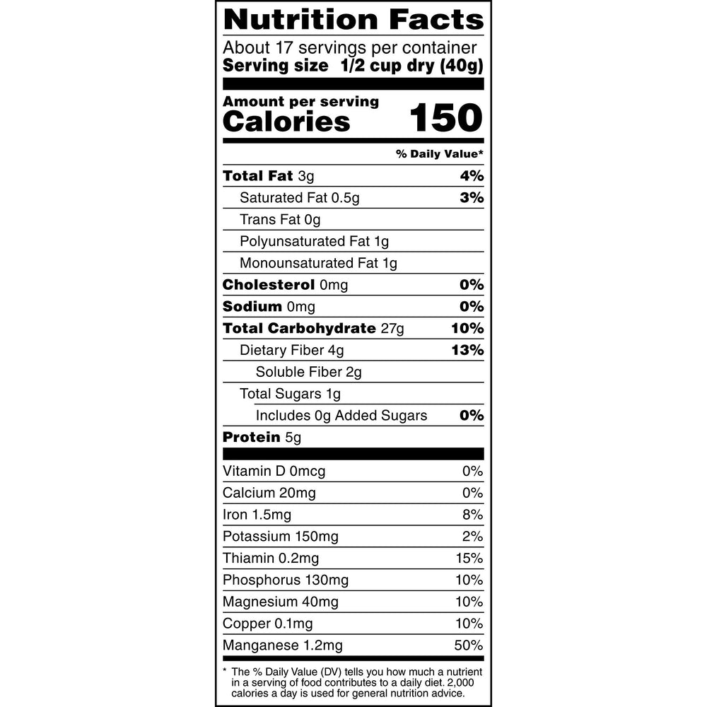 Quaker copos en mano mostrando calidad y aspecto de grano entero