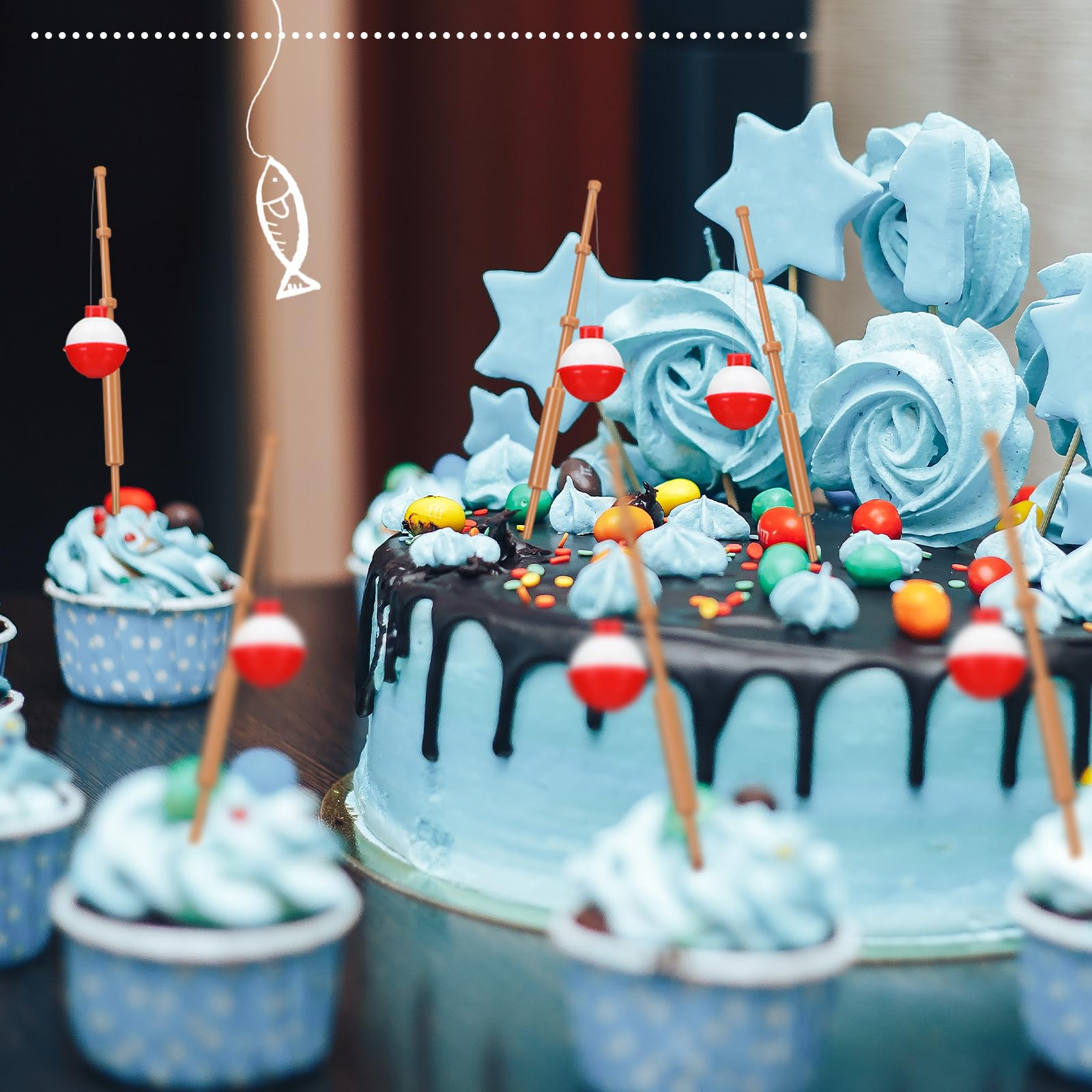 Reallnaive mesa de fiesta temática pesca con los toppers decorando postres