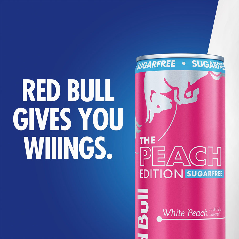 Red Bull gotas en lata que muestran textura fría y renovación inmediata