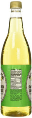 Rose's Lime Juice comparación de tamaño junto a vaso para referencia visual