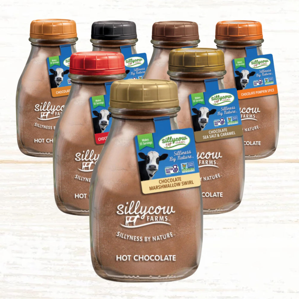 Sillycow Farms frasco junto a objetos para comparar tamaño y porciones